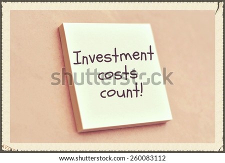 Text investment costs count on the short note texture background
