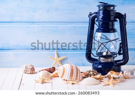 Marine items on wooden background. Sea objects on wooden planks. Selective focus.
