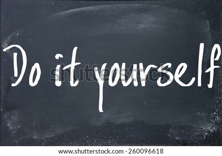 do it yourself text write on blackboard Royalty-Free Stock Photo #260096618