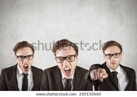 Nerdy businessman shouting against white and grey background