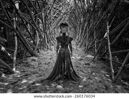 the black queen.black and white photo of the girl freak running along the corridor of the branches 