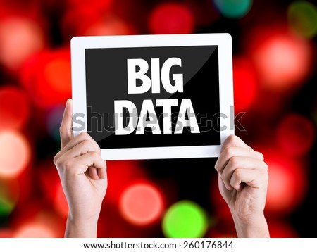 Tablet pc with text Big Data with bokeh background