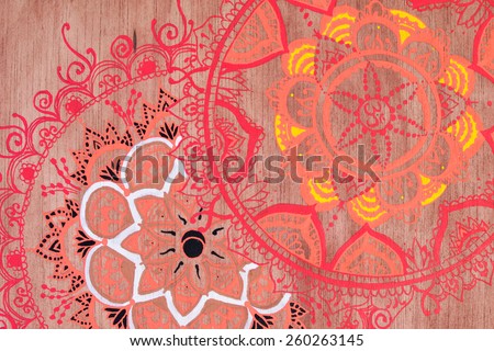 Ornamental round pattern on wood Royalty-Free Stock Photo #260263145
