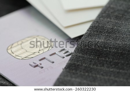 Credit cards in very shallow focus  with gray suit background as online shopping concept