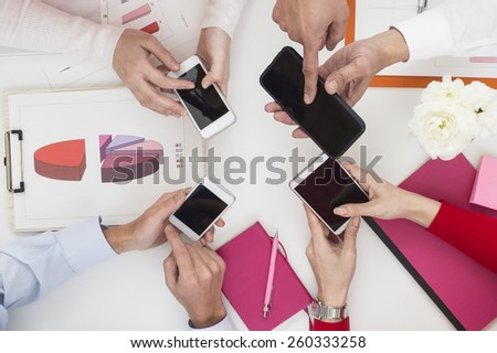 The people holding a meeting with smart phone