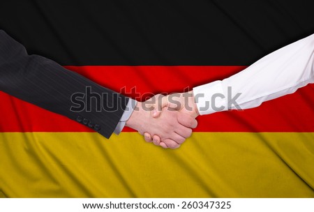 handshake on a germany flag background