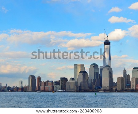 Downtown Manhattan skyline at sunset over Hudson River in New York City