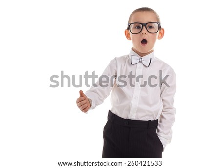Young boy laughing with his thumb up