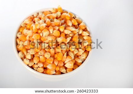 Close up of Dried corn in bowl used for making popcorn 