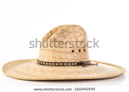 Straw Work Hat shaped in old fashioned High Peak Western Style.  White background with copy space.