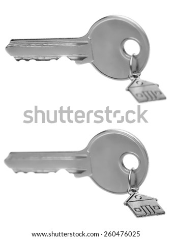 Key on a brelka with the house on a white background, nobody.