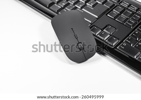 black and white keyboard with  mouse on a white background
