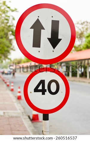 two way sign with speed limit
