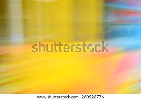 Blurred background texture. Yellow, red, blue and pink colors.