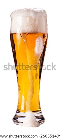 full glass of light beer isolated on a white background
