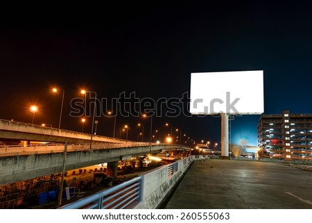 Blank billboard at night for advertisement.
