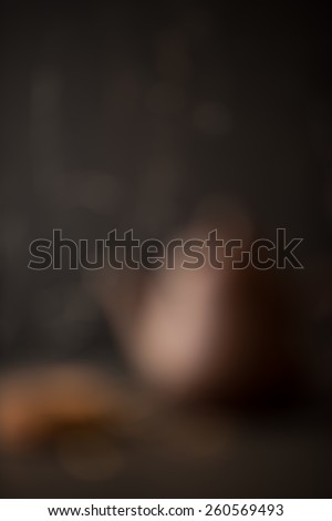 Blur background of food donut and teapot