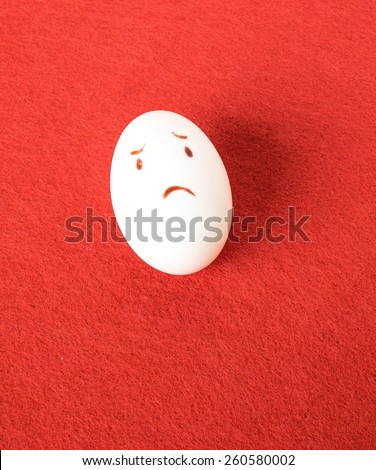 Funny easter emotion eggs isolated on red