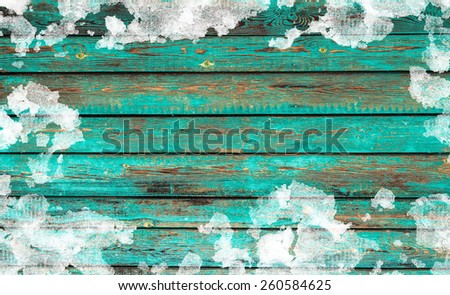 wooden background in snow surface