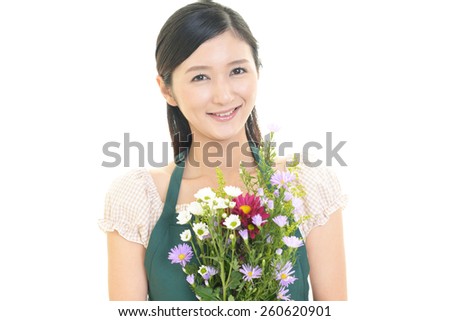 Lady works in Flower shop