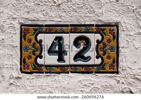 House numbers in different styles and colors (concept for real estate)