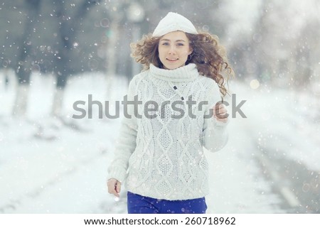 Winter portrait of woman snow