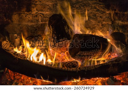 The warmth of a blazing fireside Royalty-Free Stock Photo #260724929