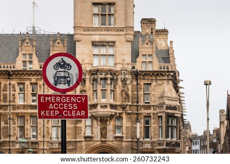 Traffic Sign : Motorbike and Car -- Emergency Access Keep Clear with vintage building background