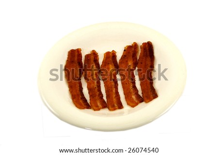 five pieces of bacon on a pale white plate viewed at a higher angle