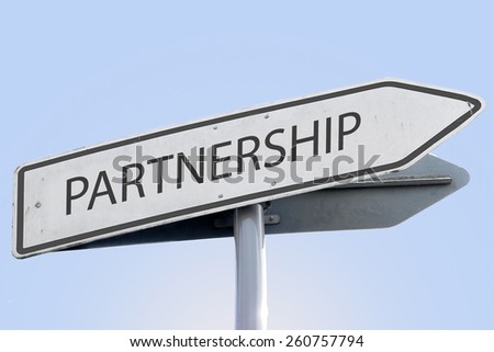 PARTNERSHIP word on road sign