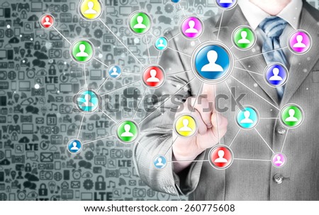 man hand pressing social media icon