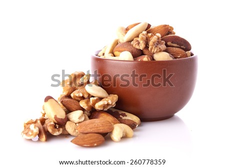 Mix nuts  on white background Royalty-Free Stock Photo #260778359