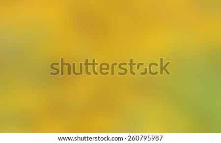 Blurred background derived from a photo taken in summer of a bed of yellow flowers.