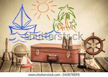 Vacations and summer travel concept. Vintage nautical things against grunge wall. Drawing sea and beach