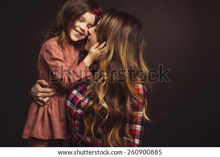 Mom and daughter playing together