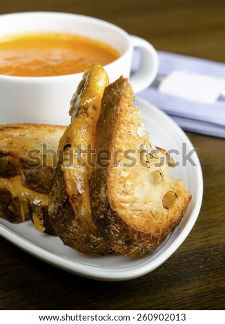 Grilled Cheese Sandwich and cream of pumpkin soup 