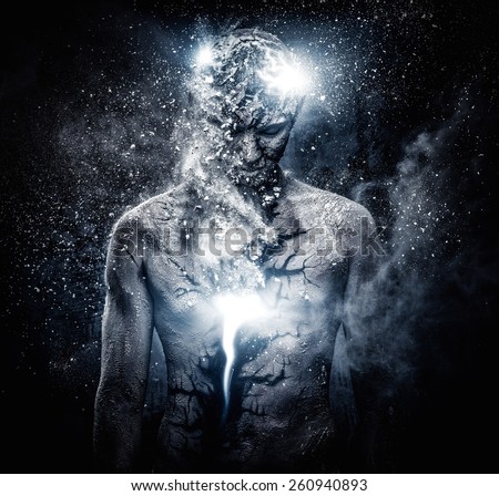 Man with conceptual spiritual body art