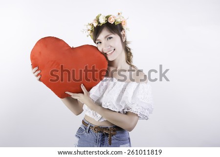 women with holding red hart