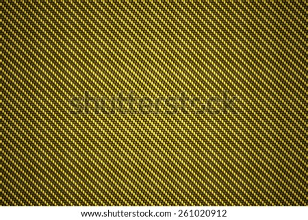 carbon kevlar texture background with golden