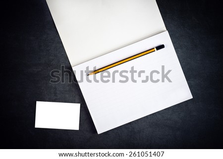 Top View of Blank Corporate Business Card and Notebook with Graphite Pencil as Copy Space for Branding