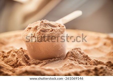Whey protein scoop. Sports nutrition. Royalty-Free Stock Photo #261069146