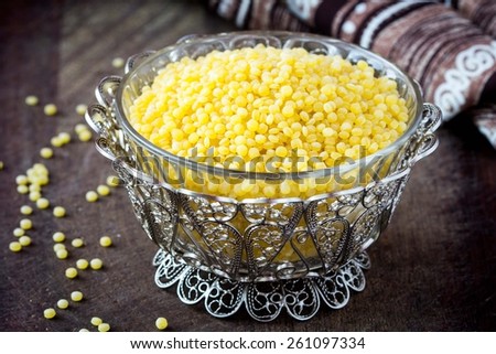 Israeli couscous ptitim, unprepared, dry, healthy cereals, tasty diet ingredient