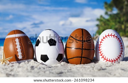 Sport eggs on ocean beach â??easter symbol