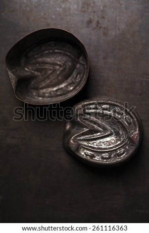abstract picture with Vintage horse shoe shape Baking Tins or molds, tiny focus