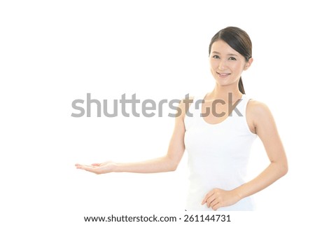 Woman pointing her left side 