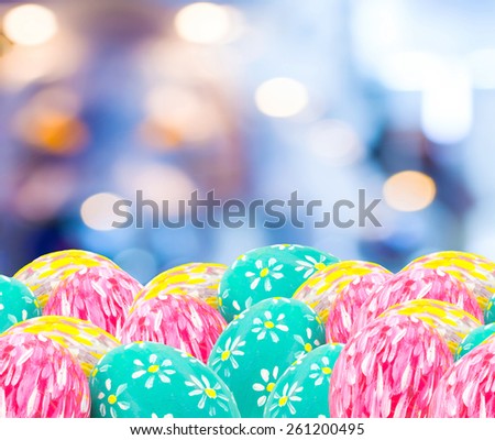 image of blurred bokeh light and easter eggs  for background usage
