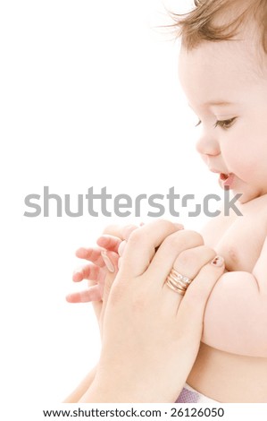 picture of happy baby in mother hands