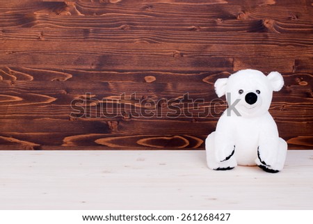 cute teddy bear toy on  board top view