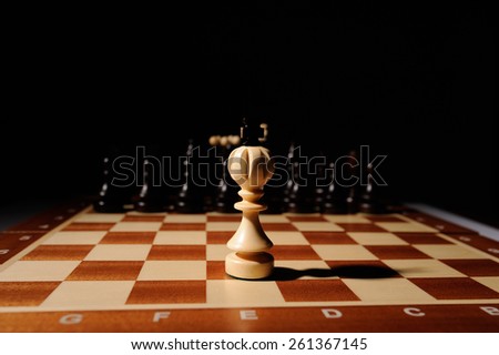 wooden chess pieces with chess desk