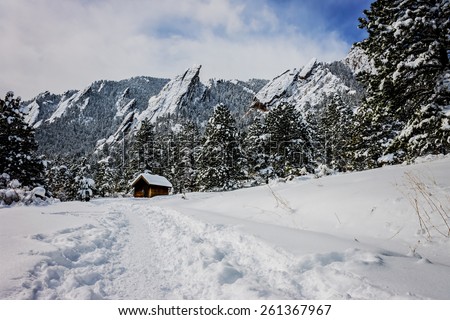 landscape photo of flat irons in boulder colorado with focus on the shack in the foreground